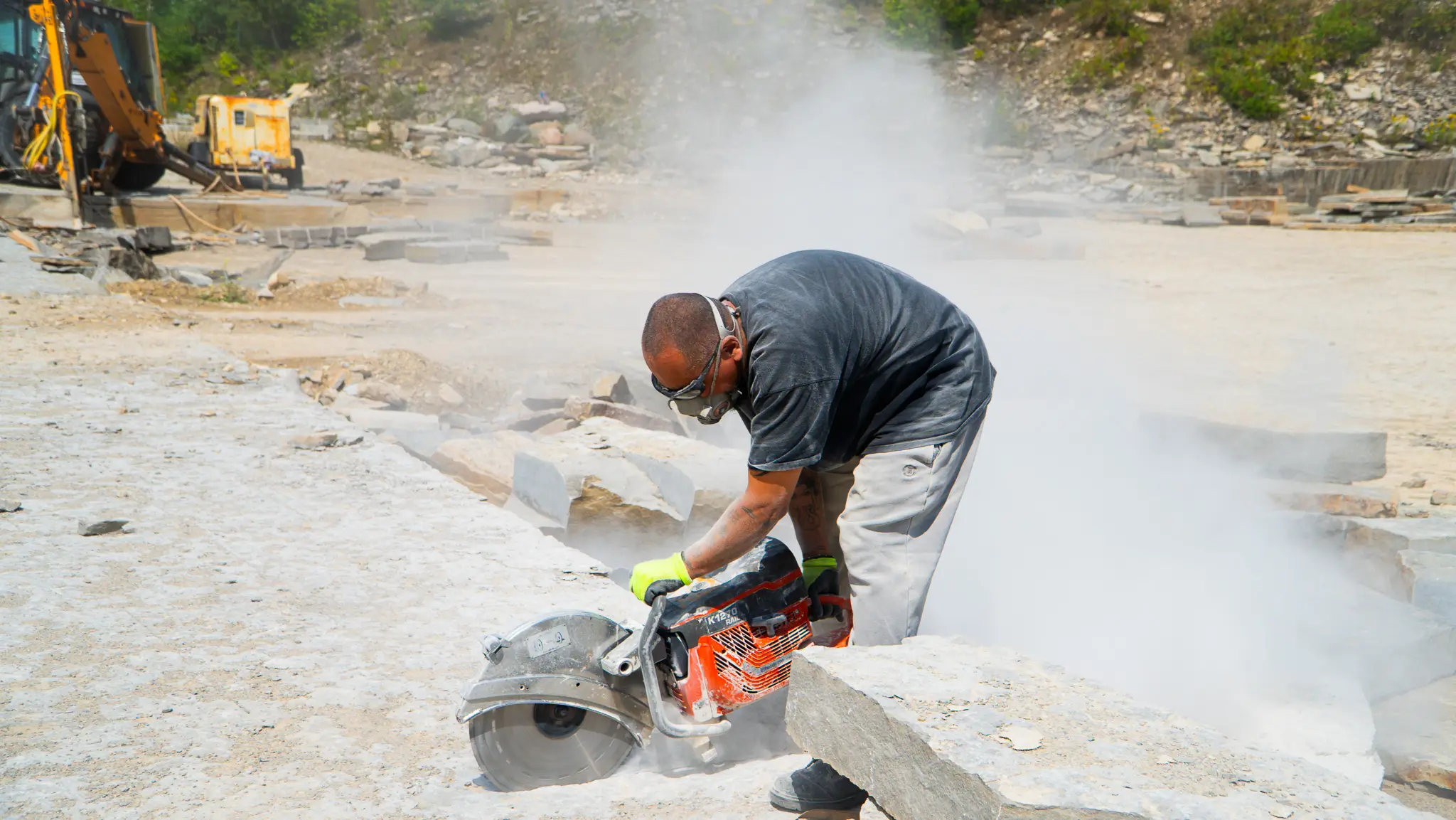 Cutting natural stone on site at Lime Kiln Quarry, Manitoulin Island