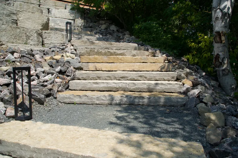 Detail of the stone stair treads with integrated lighting